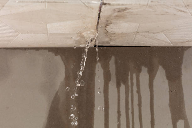 Professional Flood Damage Cleanup technician working in North Scituate, MA